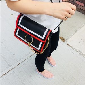 Last one! NWT Black red gold O-ring colorblock bag